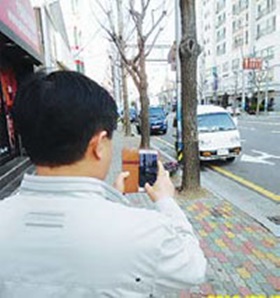출퇴근 시간 간선도로변 불법 주·정차 스마트폰 신고제